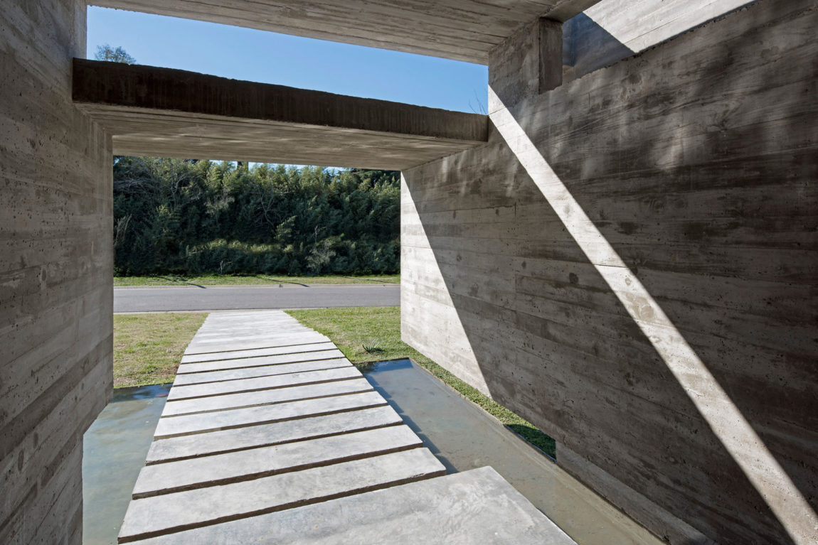 Spectacular Concrete House Surrounded by Fields and Vegetation-20