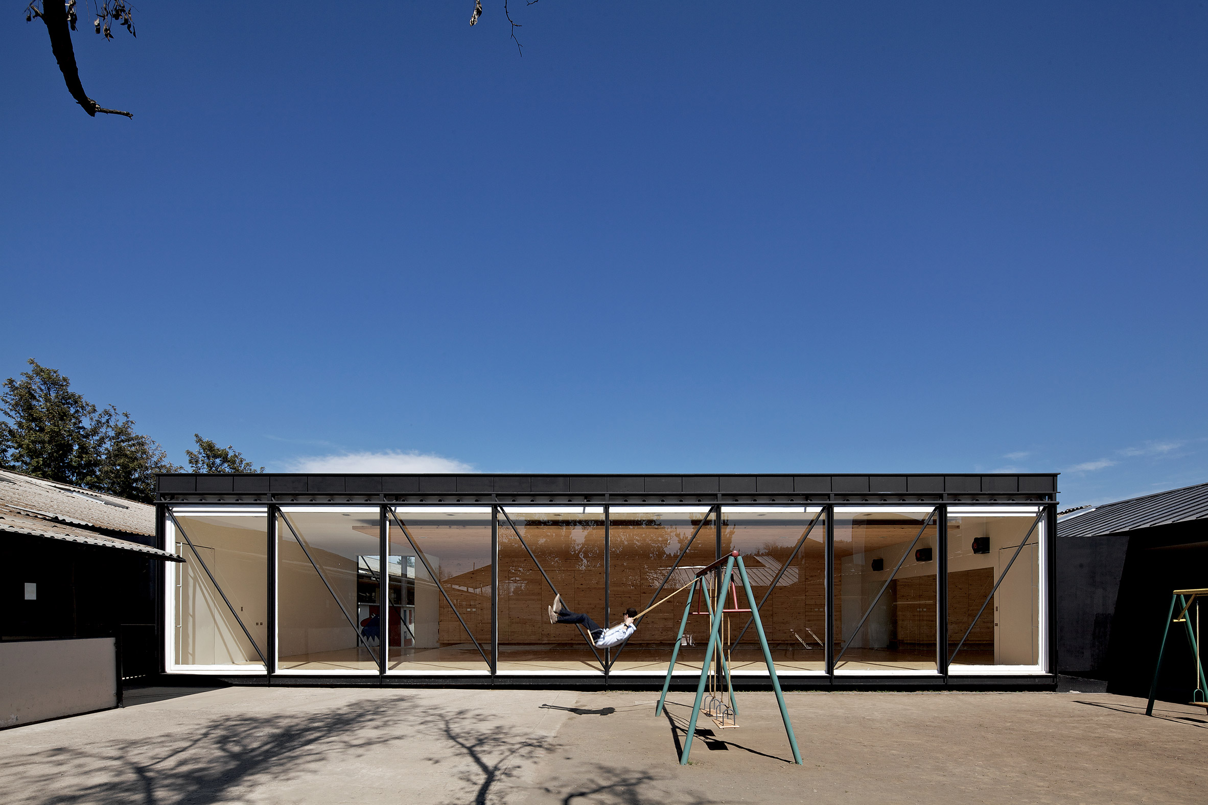 García and Soler give Chilean school a new look with light chimneys and metal cladding-12