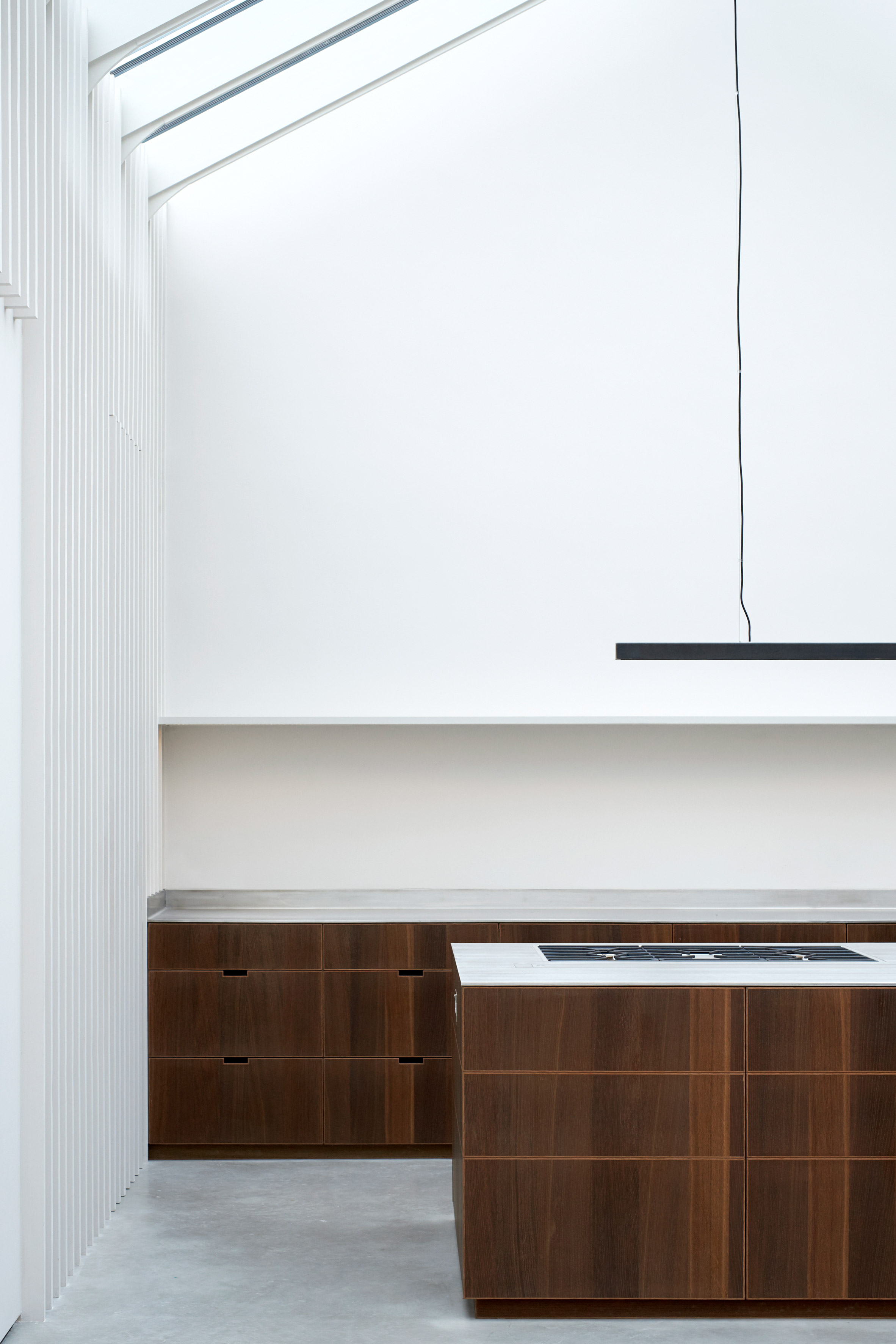 McLaren Excell contrasts smoked oak with white panelling in renovated London offices-10