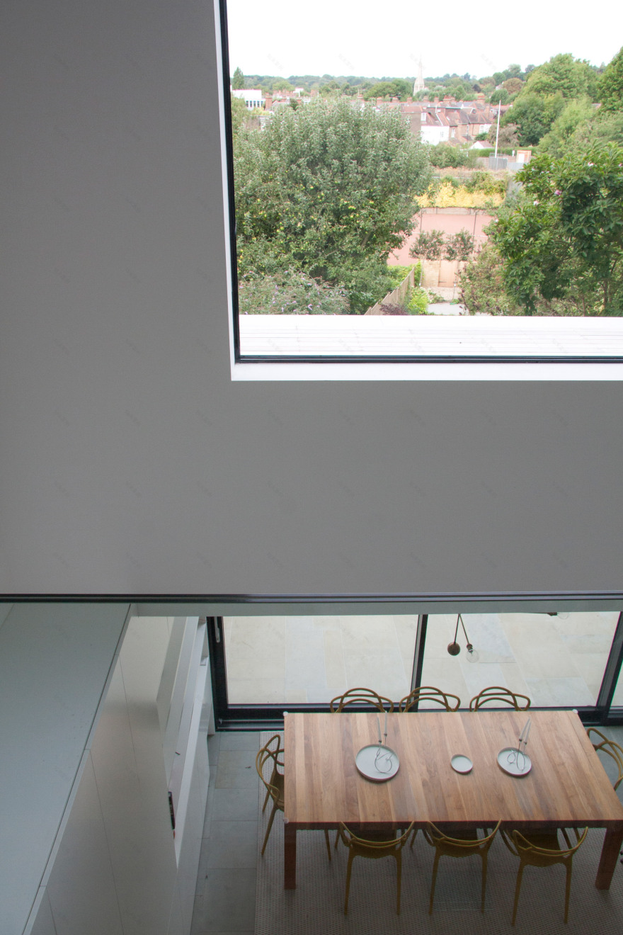 Shelving units and concealed doors compartmentalise London home-14