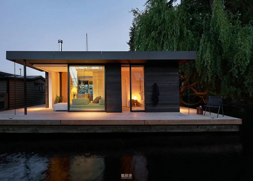 西雅图漂浮住宅 | 木质饰面与水景的完美融合-0