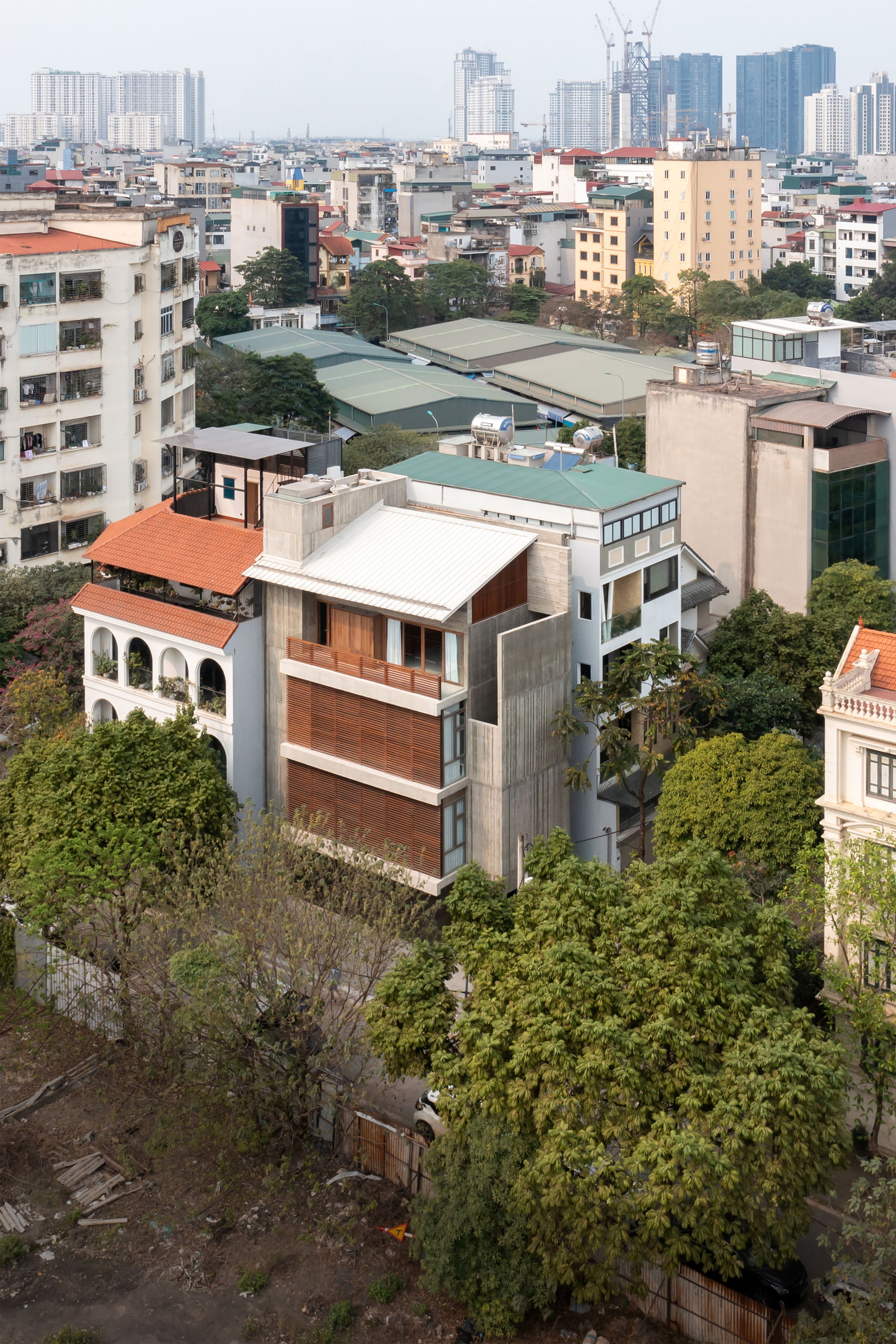Vertical Tube House - Kam and Ly House / HGAA + Jien Jun + naïve practice + Taewon Park-11