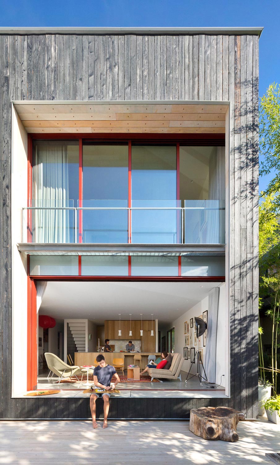 Measured Architecture has designed this modern house that opens up to a backyard patio area with a green wall   CAANdesign  Architecture and home design blog-4