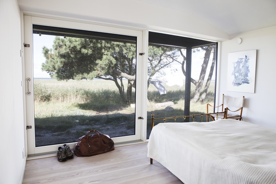 Modern Wooden House with Clean Lines and a Transparent Design-19