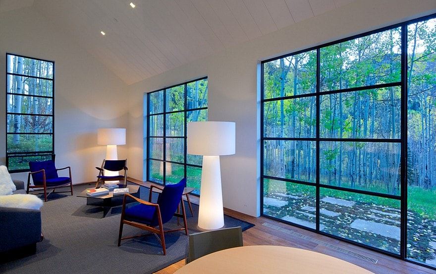 Cottage Black Provides a Retreat Within a Dense Aspen Grove-16