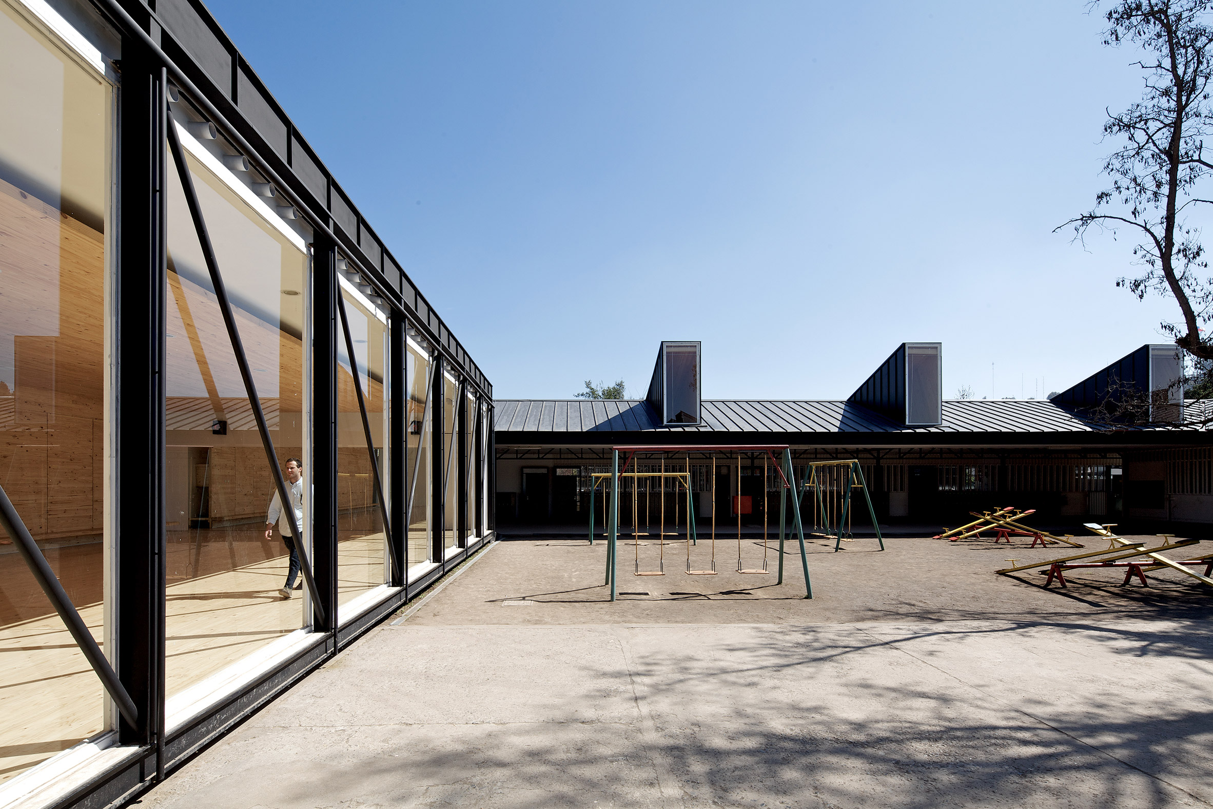 García and Soler give Chilean school a new look with light chimneys and metal cladding-9