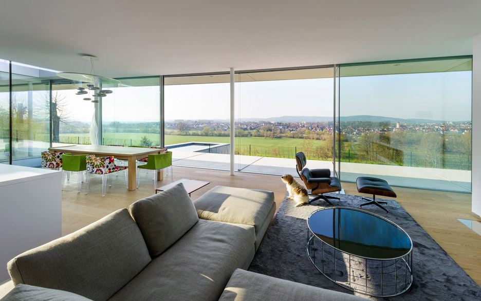 Villa K by Paul de Ruiter Architects lies long and low on a German hillside-9