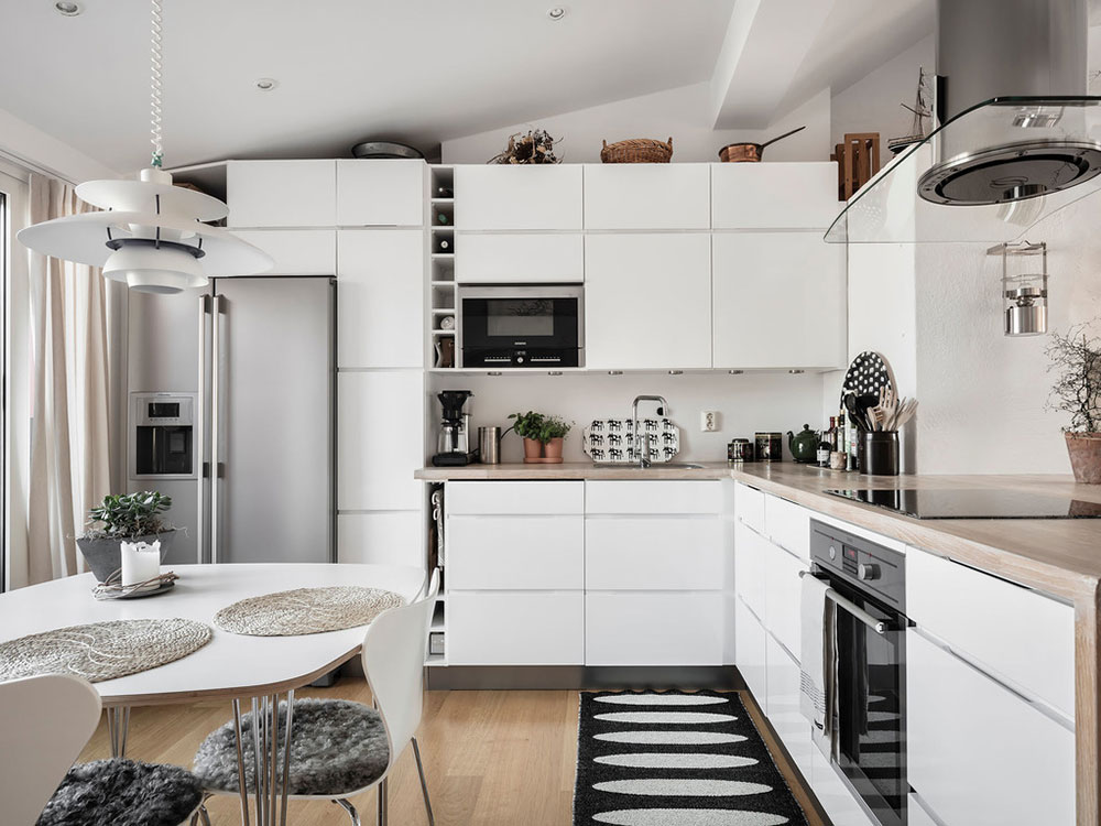 哥德堡明亮宽敞的顶层公寓设计-26