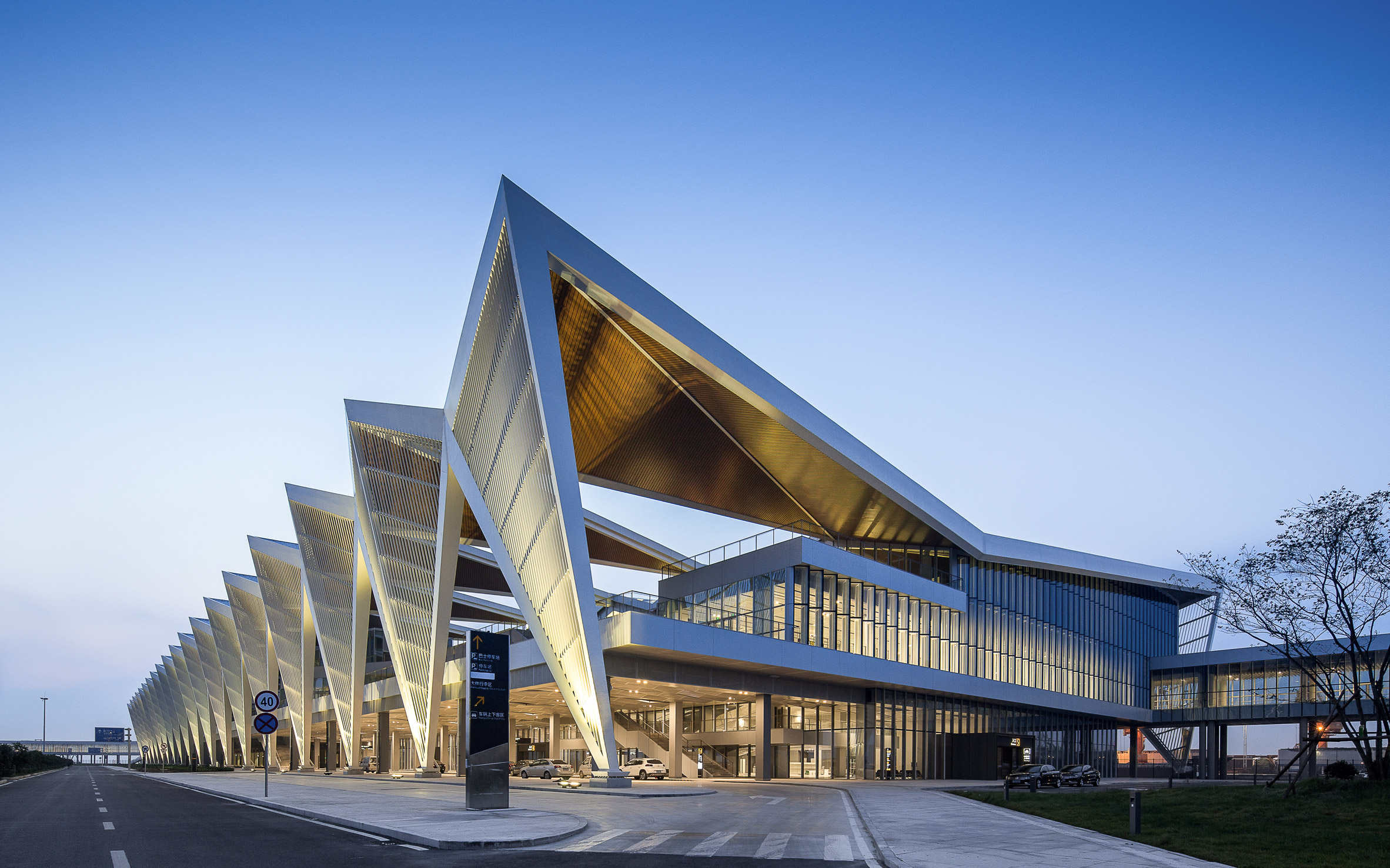 Qingdao Cruise Terminal's angular facade references boats' sails-5
