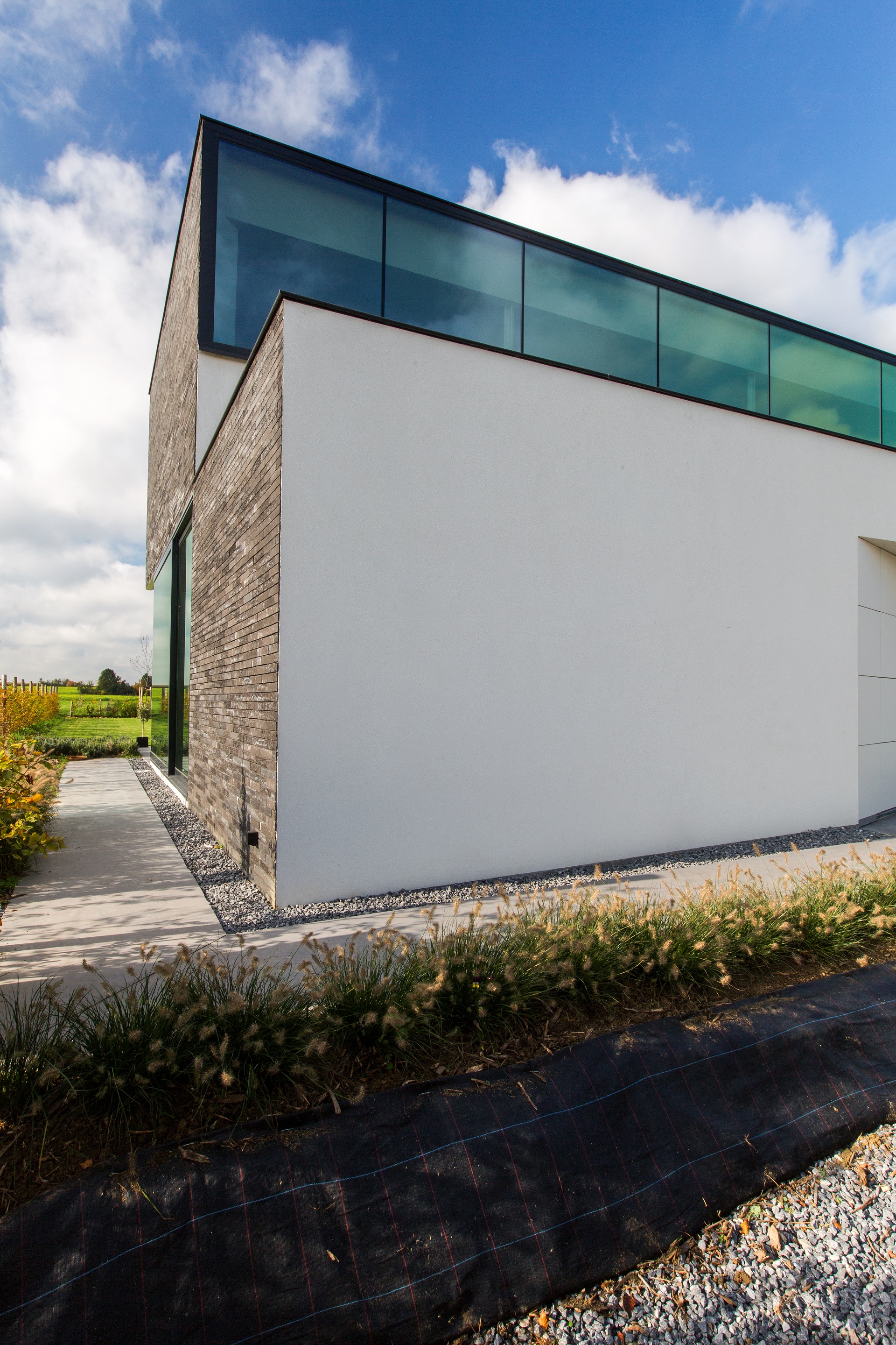 比利时比耶贝克新家庭住宅，简约生活与自然美景的融合-9