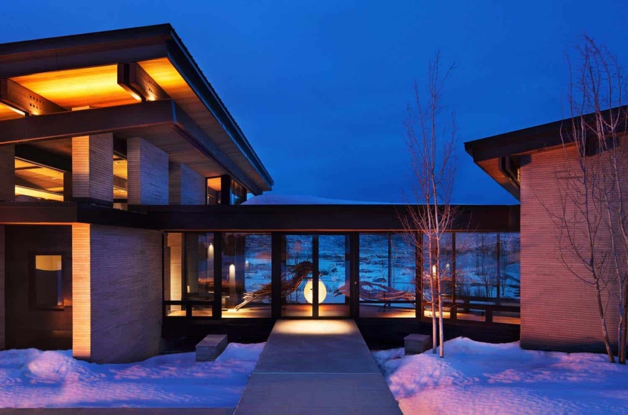 Majestic mountain home of stone and glass dominates its Utah landscape-23