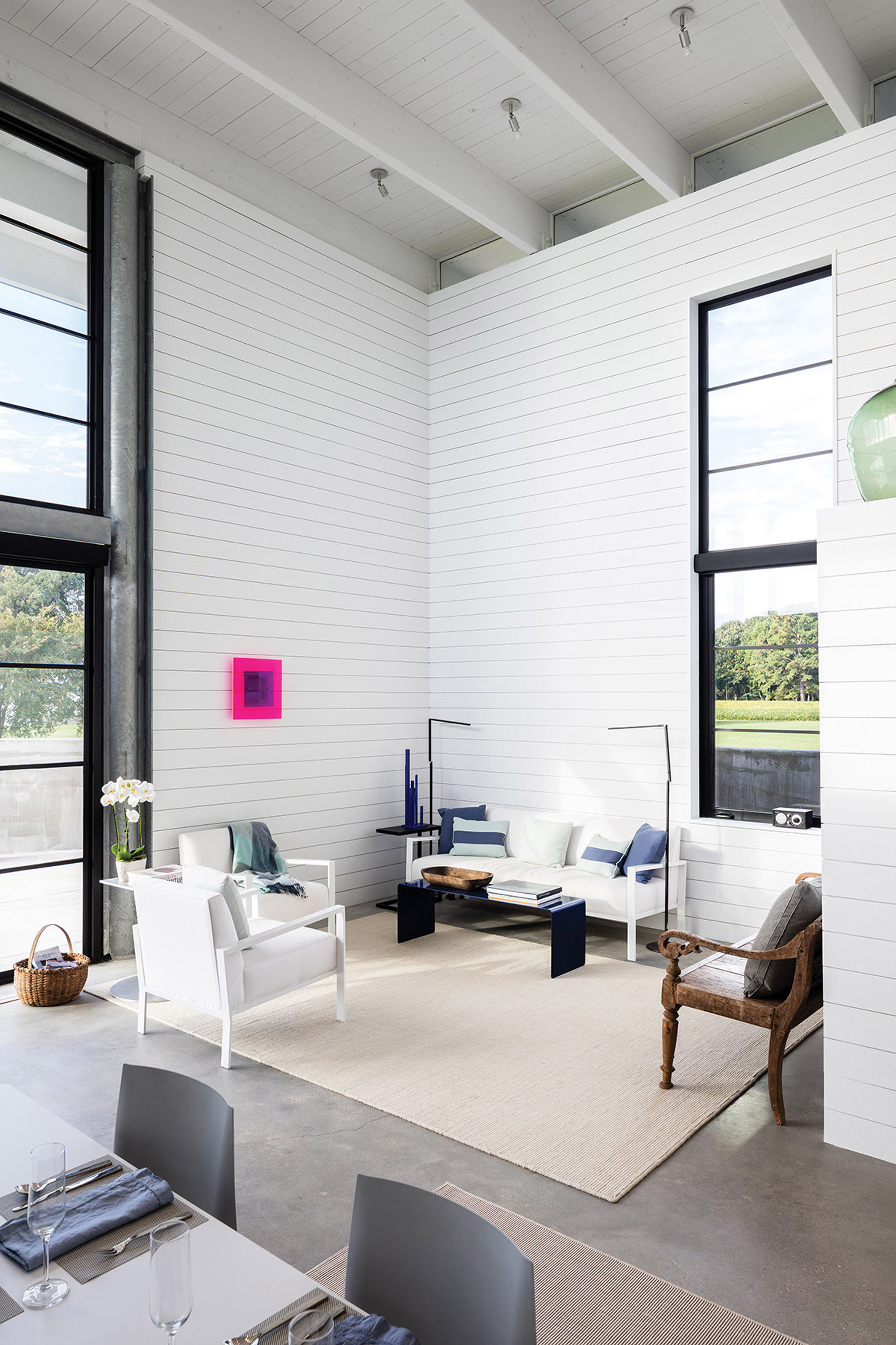 Virginia cabin by 3north features fully glazed corner with river views-7