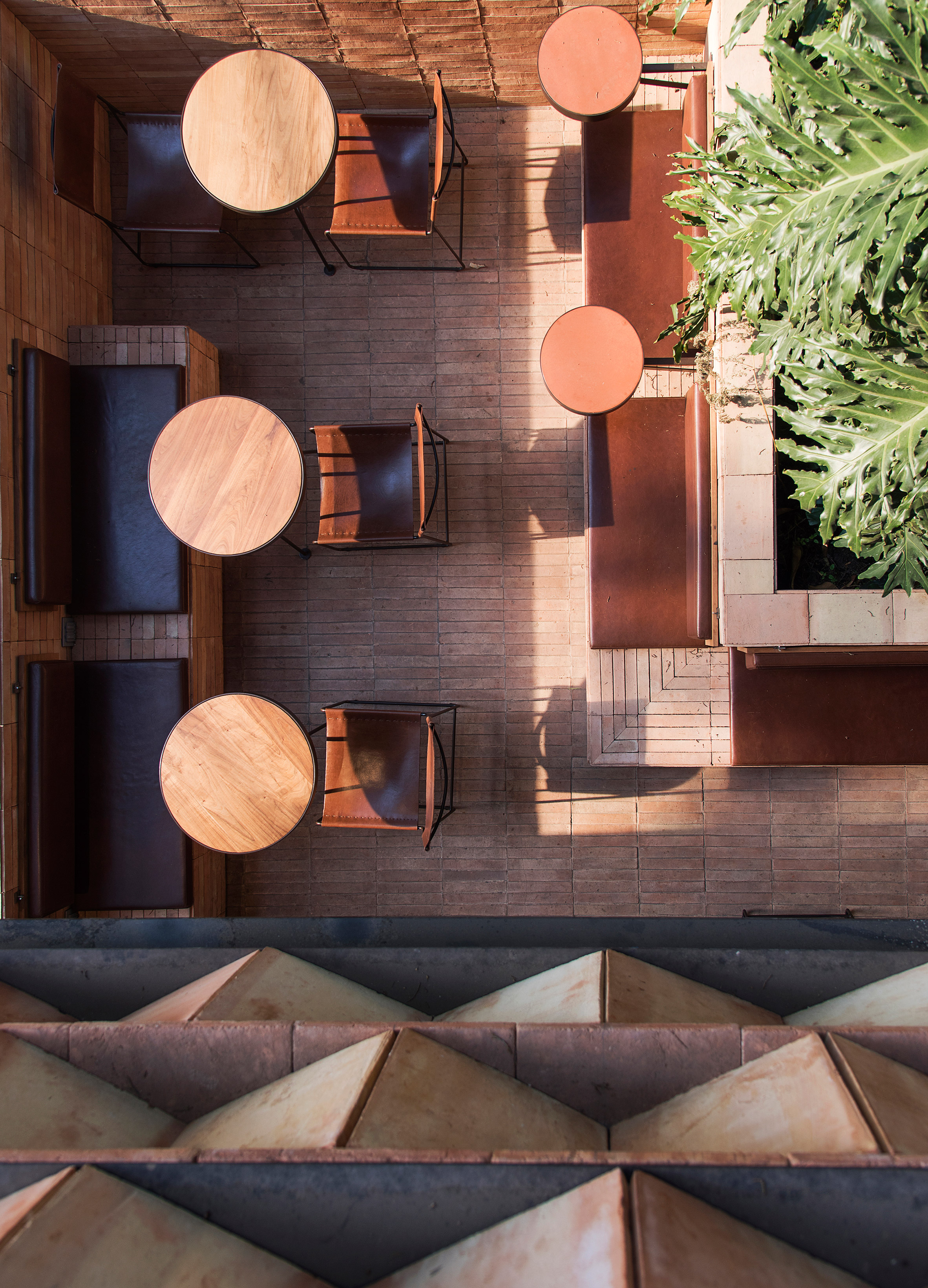 Faceted wooden panels form Mexico City cafe by Esrawe and Cadena-12