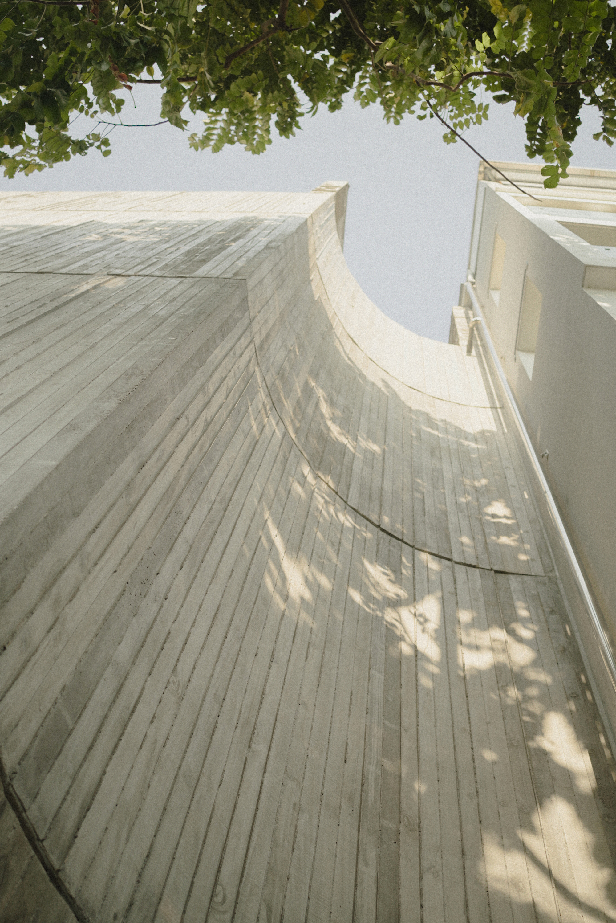 Vertical Tube House - Kam and Ly House / HGAA + Jien Jun + naïve practice + Taewon Park-43