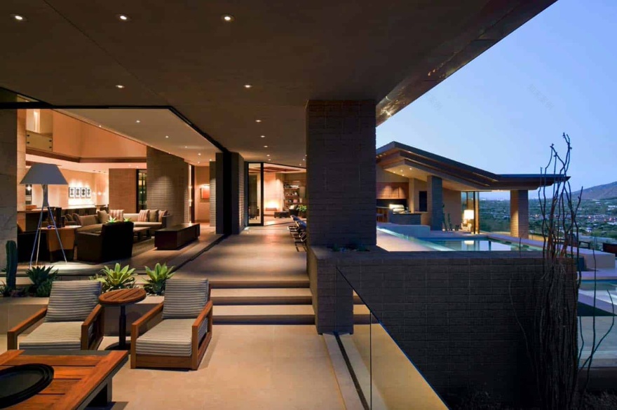 Modern desert home set on a rocky hillside with spectacular city views-5