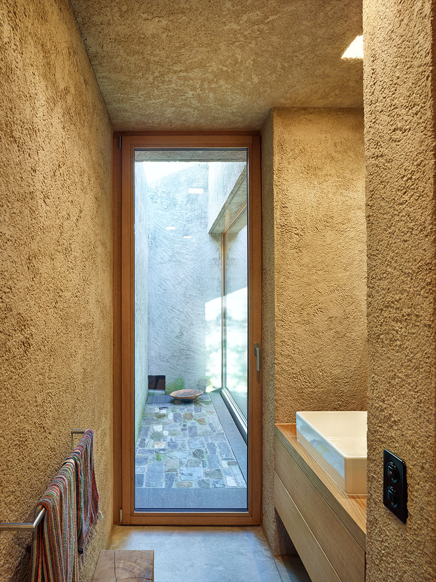 瑞士莫尔科特山坡新住宅 融入自然景观-19