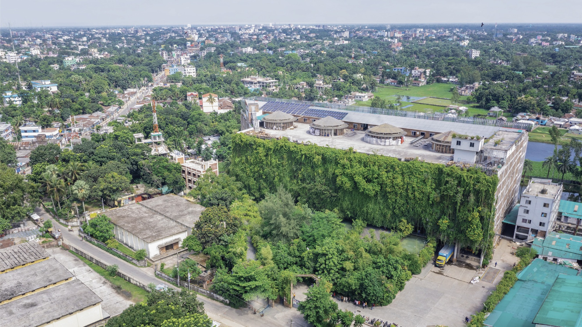 Green Field of Karupannya Rangpur Factory / Nakshabid Architects-32