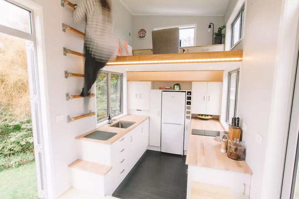 A Tiny House On Wheels With Retractable Stairs And Other Cool Features-5