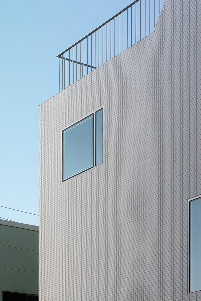 受限土地上的创意“大拇指”建筑-28