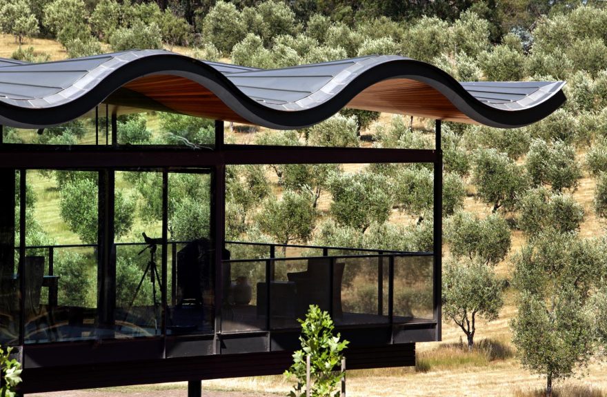 Lauriston House by Seeley Architects a floating sinuous roof placed on a contemporary glass house CAANdesign Architecture and home design blog-10