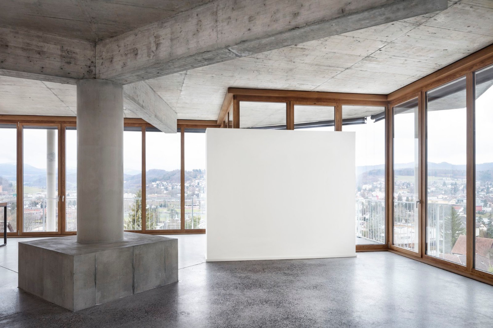 瑞士斜坡上的方形平台极简住宅-3