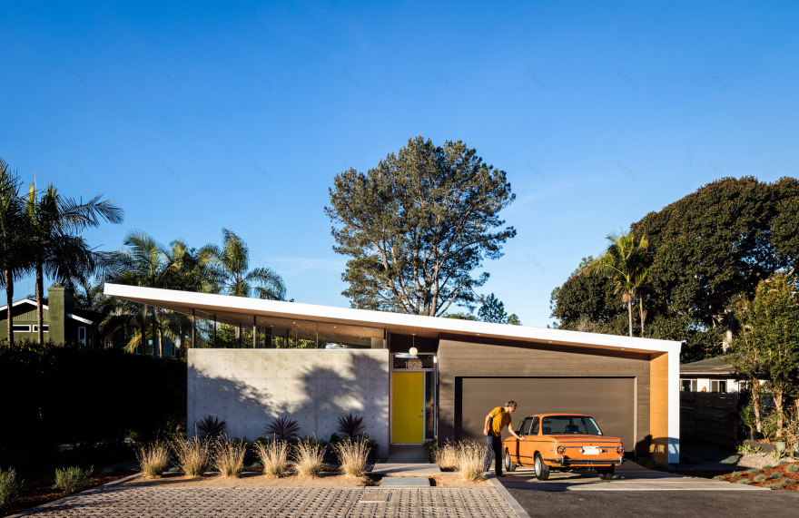 Southern California beach home features angled roof with crescent cutout-5