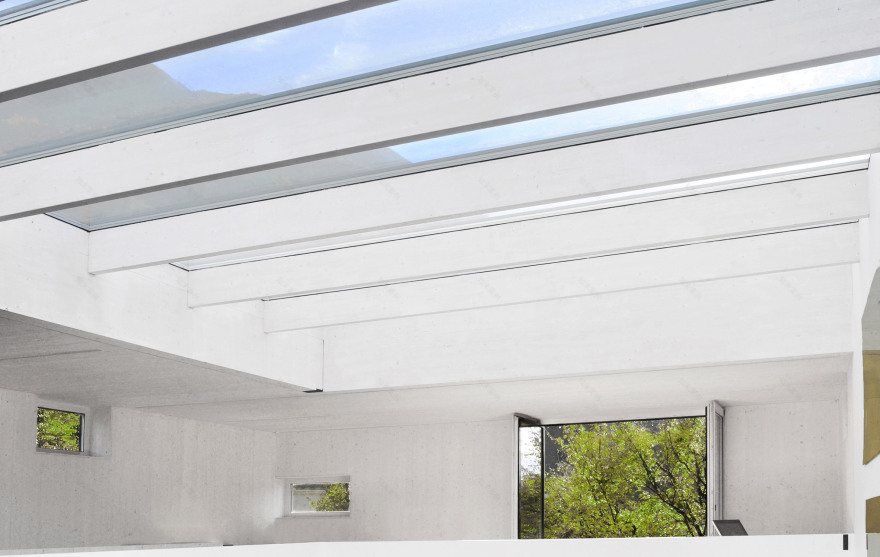 This prefabricated wooden holiday home is clad in charred timber boards-25