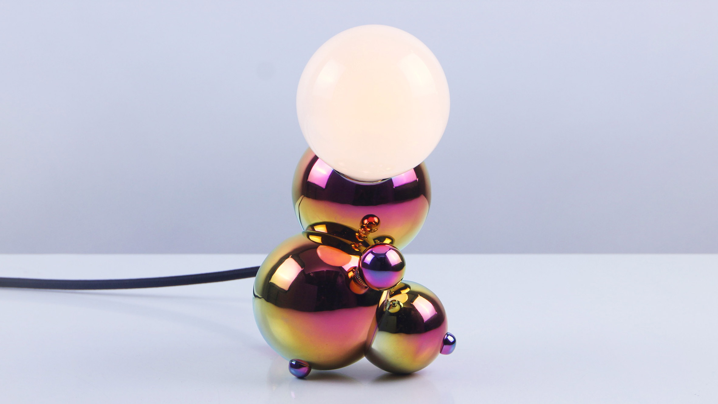 Iridescent soap bubbles inform lighting collection by Rosie Li-0