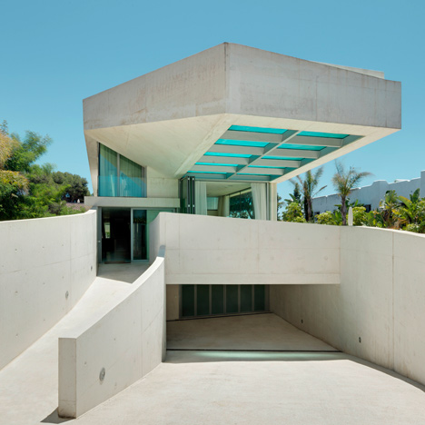 Wiel Arets' Jellyfish House has an elevated pool with a glass floor-0