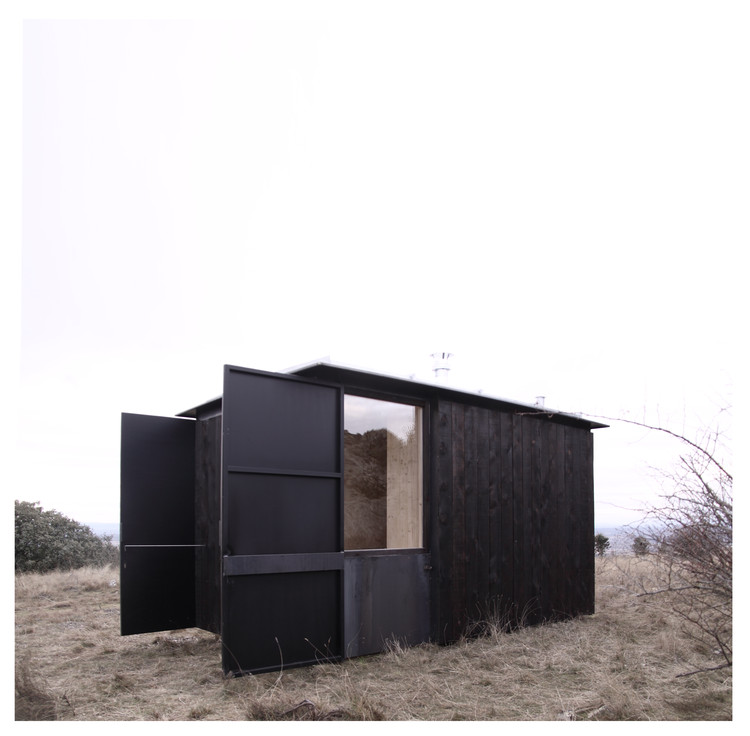 西班牙文化遗址旁的可逆式木钢展馆-22