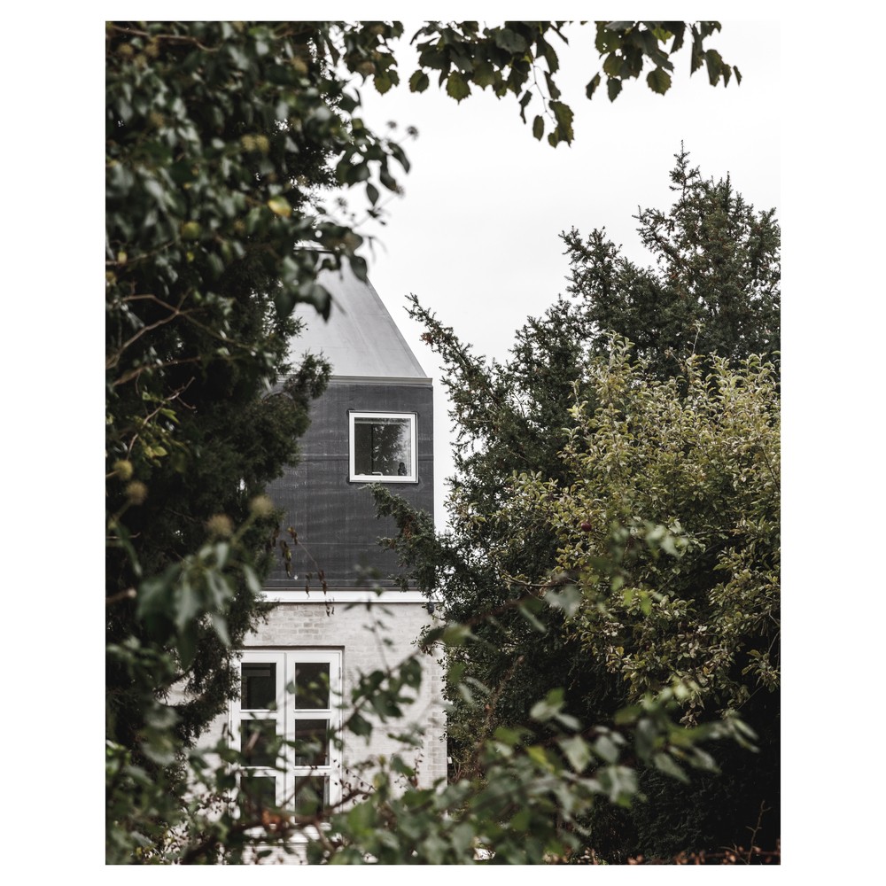 Helmet 住宅，坡屋顶的垂直扩建 / Werkt-23