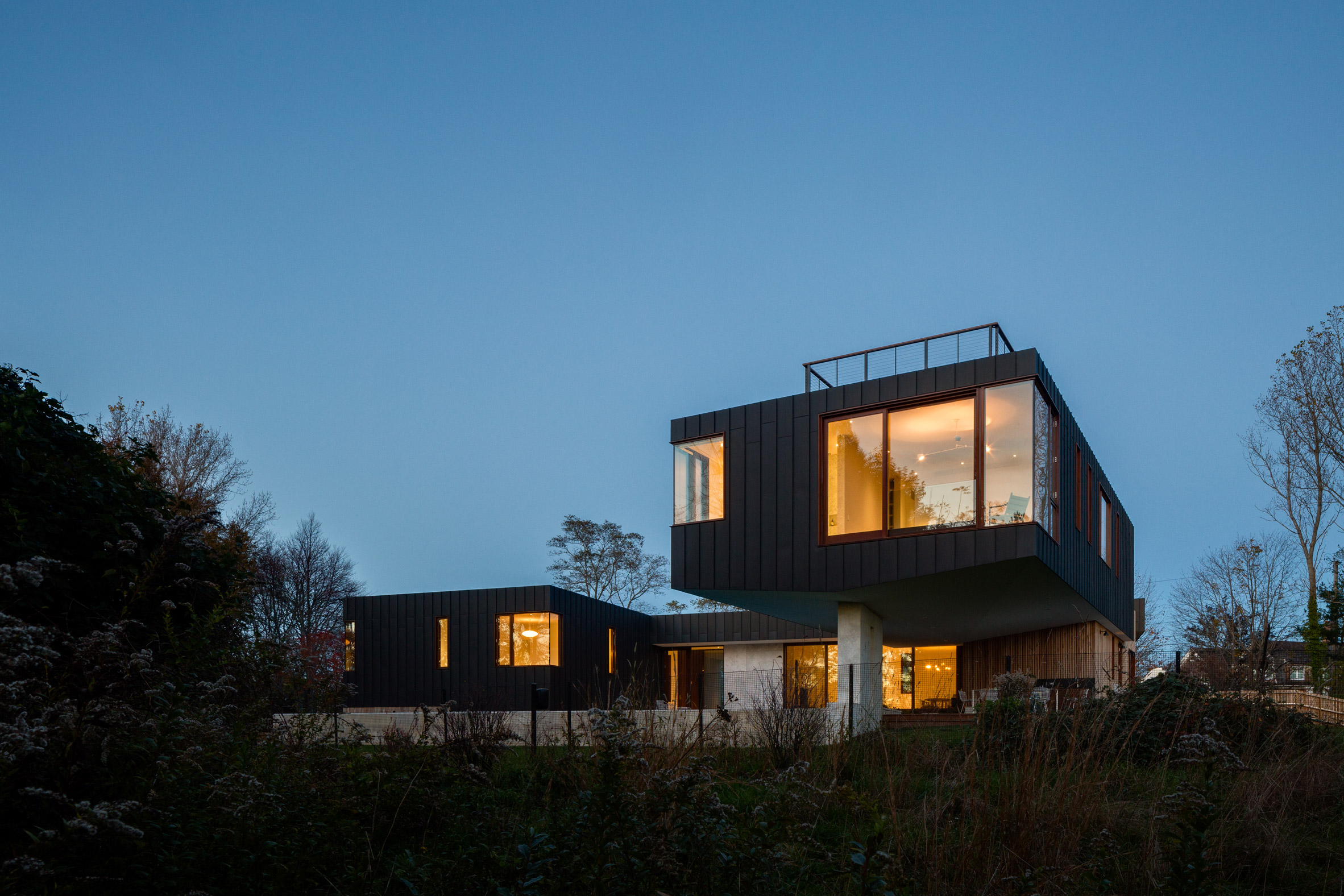 Office of Architecture elevates zinc-clad Hamptons home above a floodplain-21