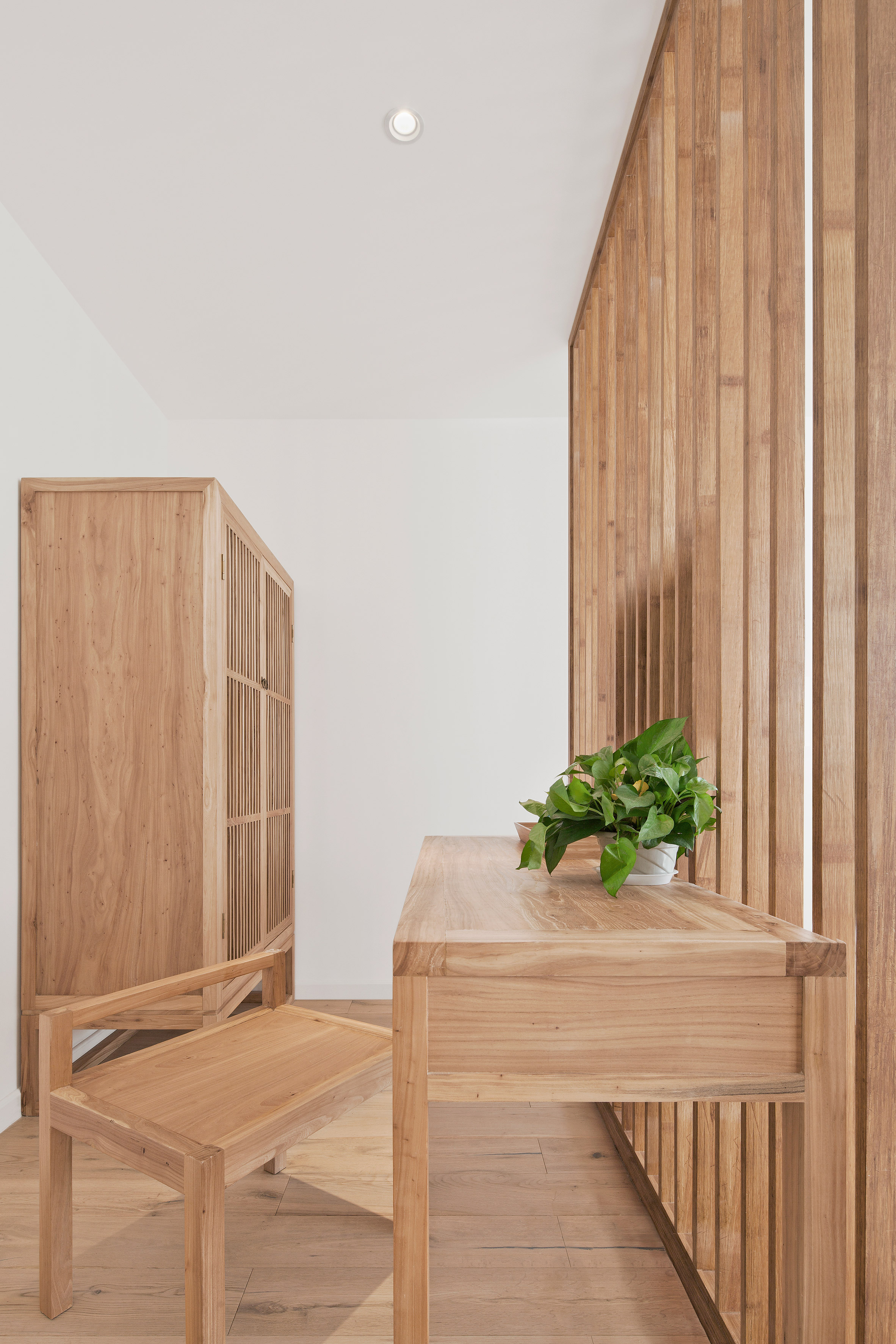 Penda inserts house-shaped opening into facade of hotel in Beijing hutong-19