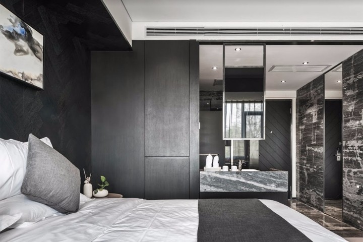 XYI Design：用沉稳打动人心的青岛时尚酒店-0