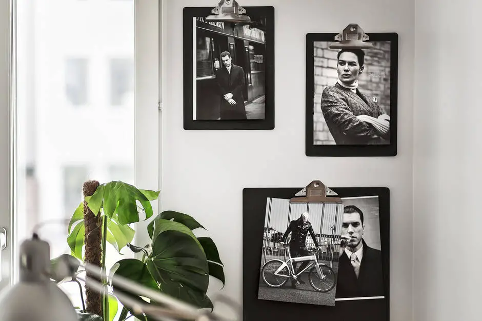 巧妙改造！衣架变客厅照片展示架-13