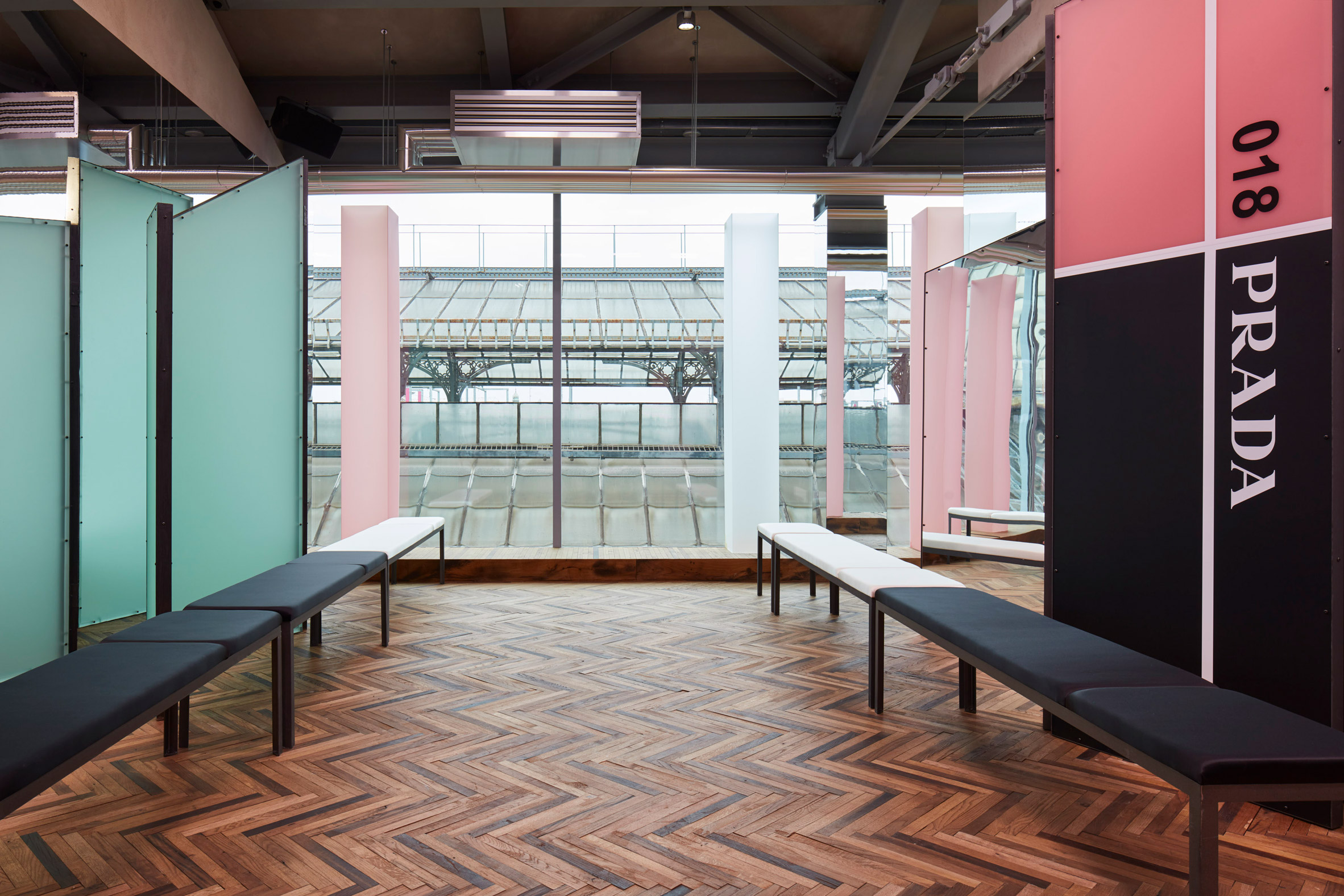 AMO uses mirrors and millennial pink to create a disorientating catwalk for Prada's debut Resort show-2