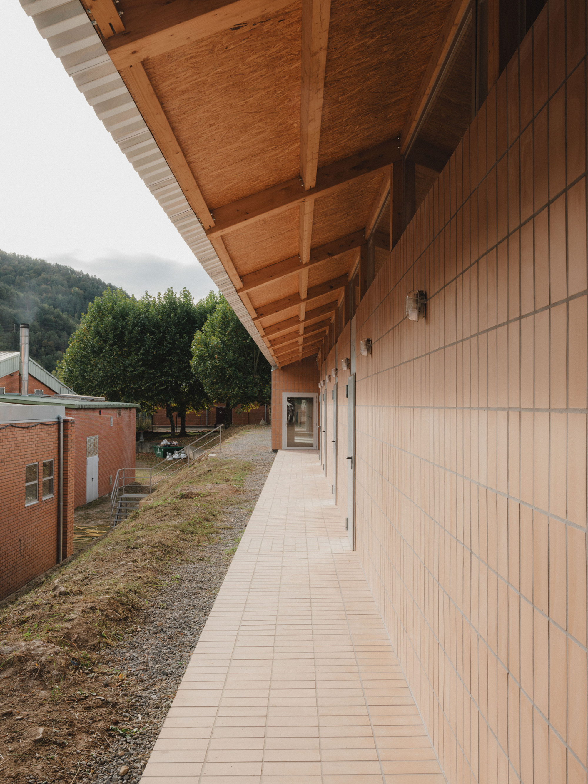 Ripoll - Changing Rooms and a Multi-Purpose Hall / MH.AP Studio + Sergi Serrat-11