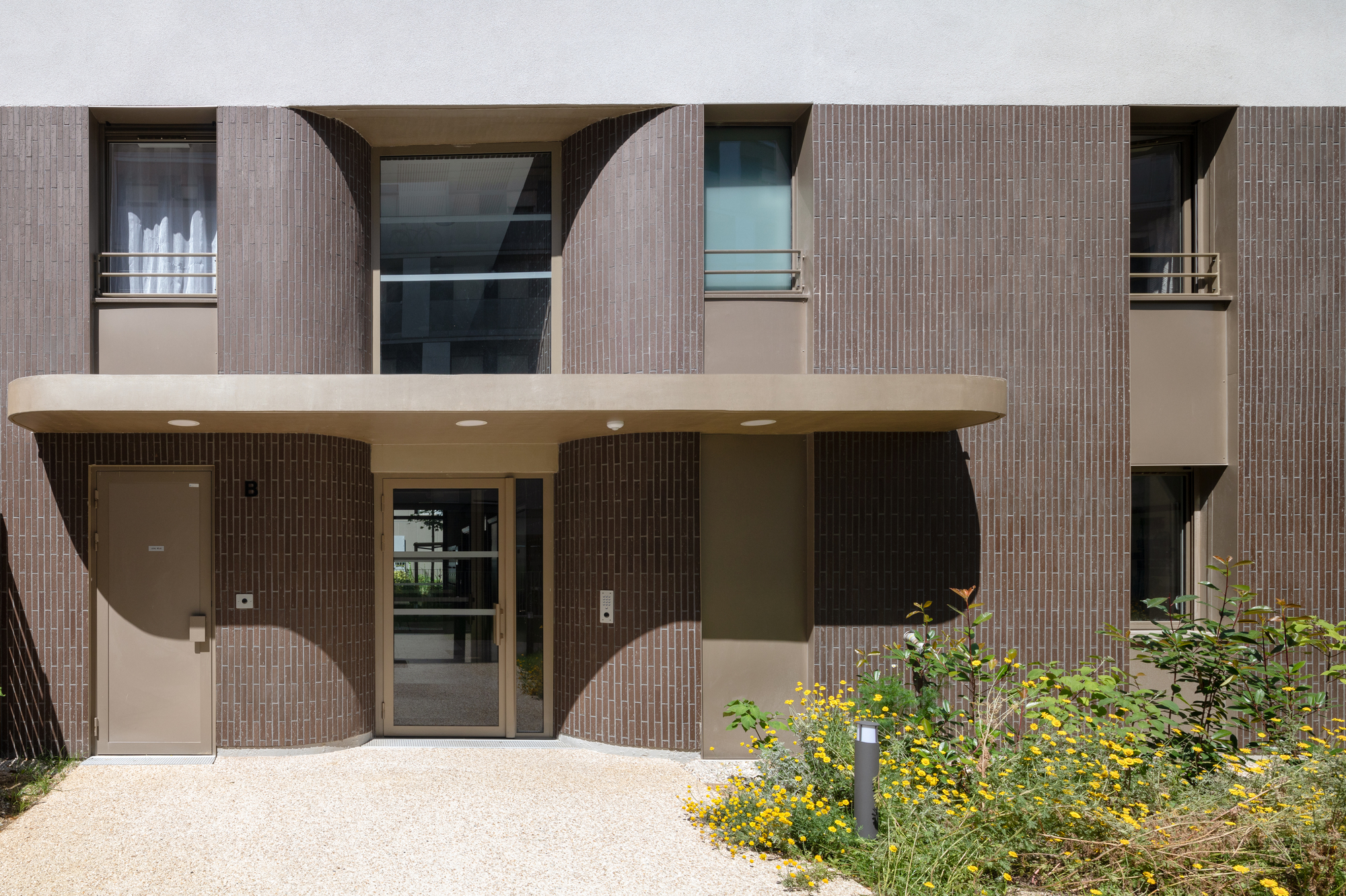 46 Apartments in Gentilly / Tectône-32