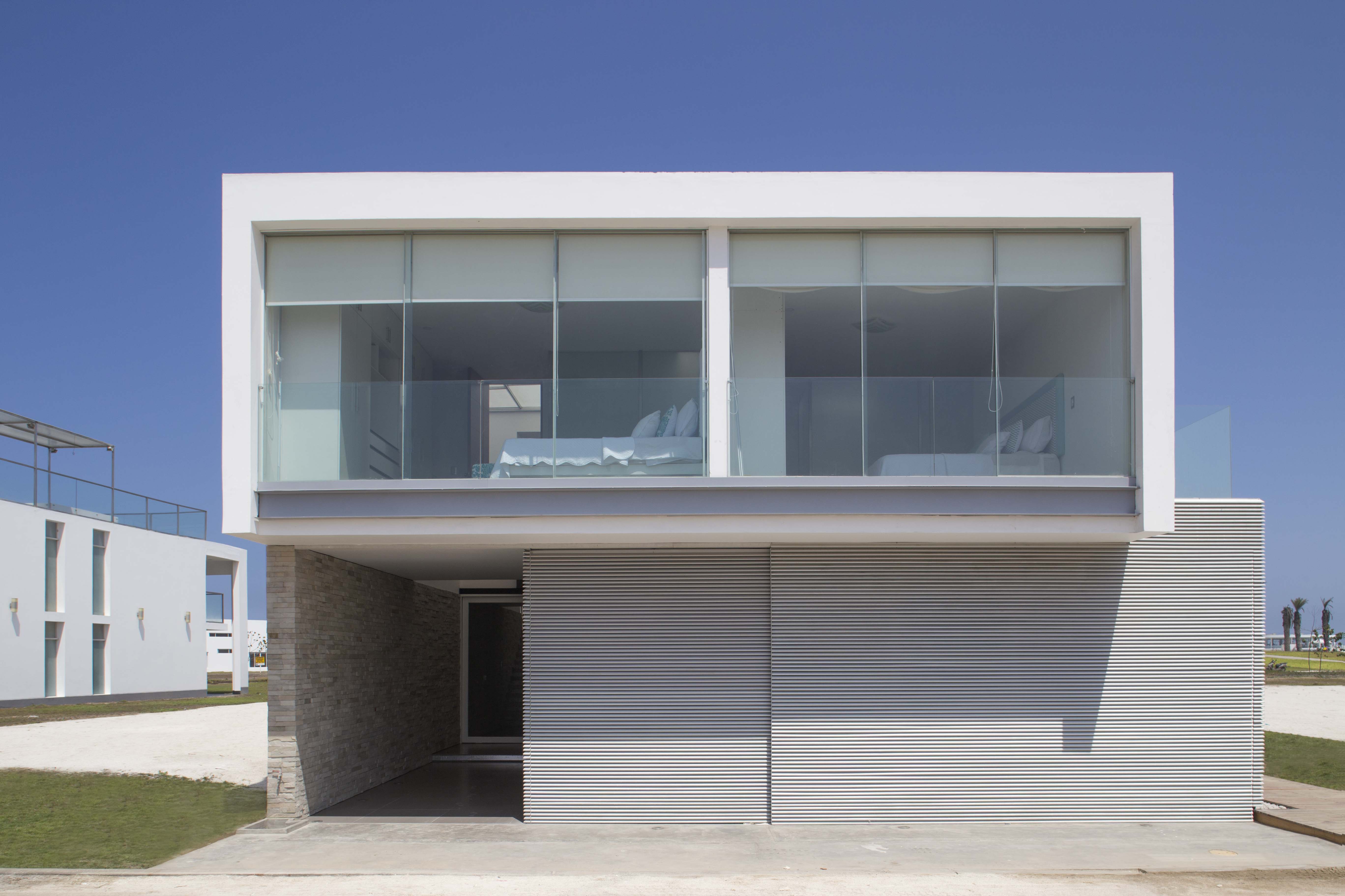 三立方体秘鲁海滩别墅 | 创新空间设计，三家庭共享和谐生活-31