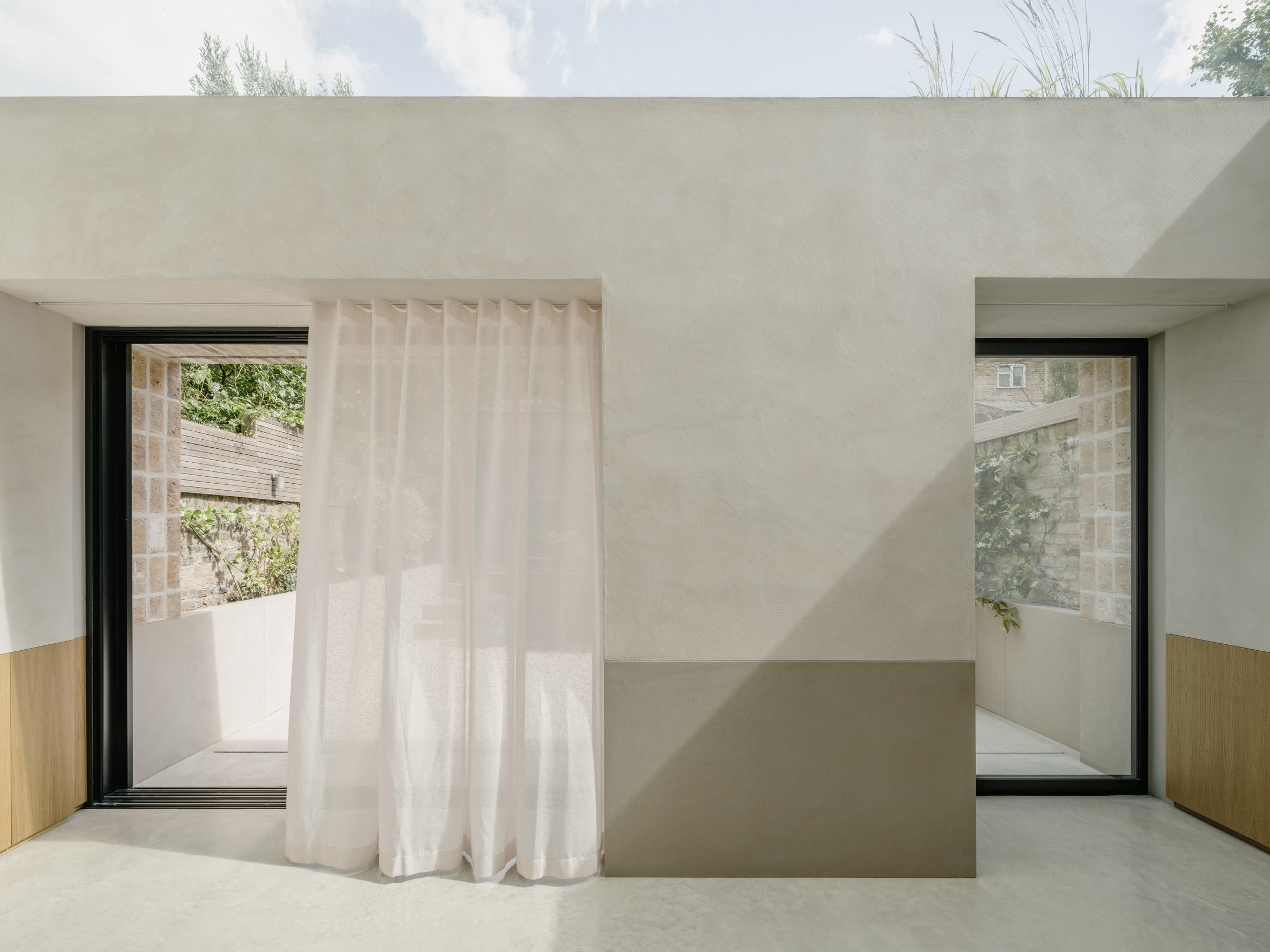 DHaus brings "sense of openness" to Datum House with wall-to-wall skylight-7