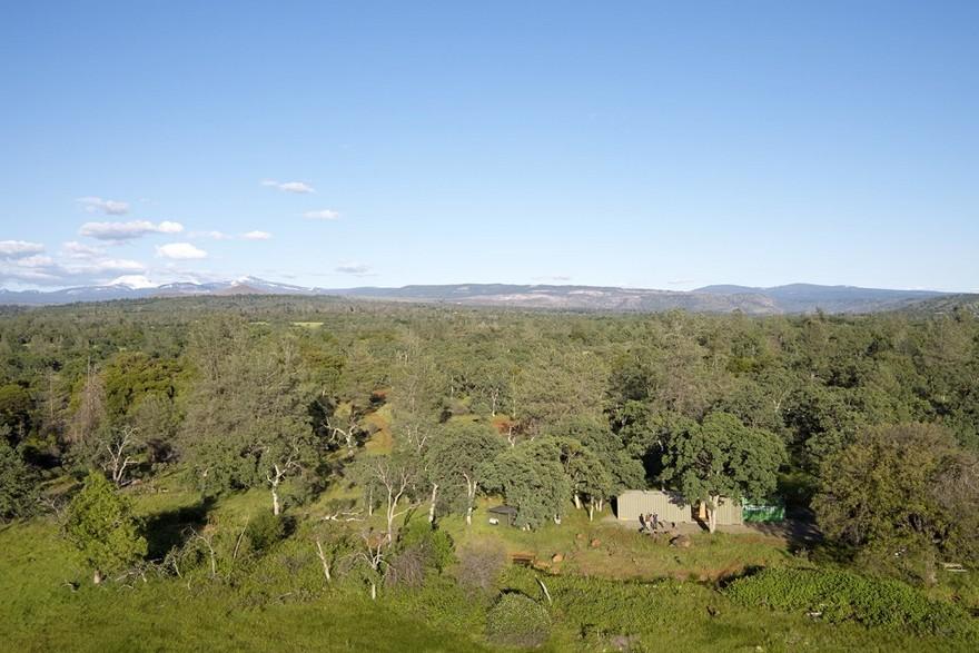 40′ Highboy Shipping Container Turned into a Cozy Hunting Cabin-17