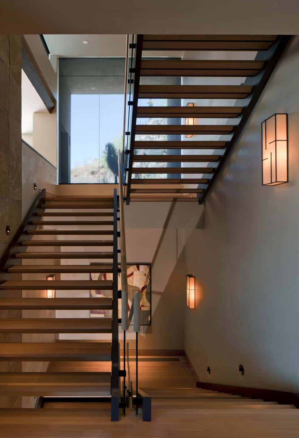 Modern desert home set on a rocky hillside with spectacular city views-17