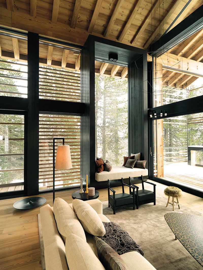 现代瑞士阿尔卑斯山滑雪坡旁小木屋-4