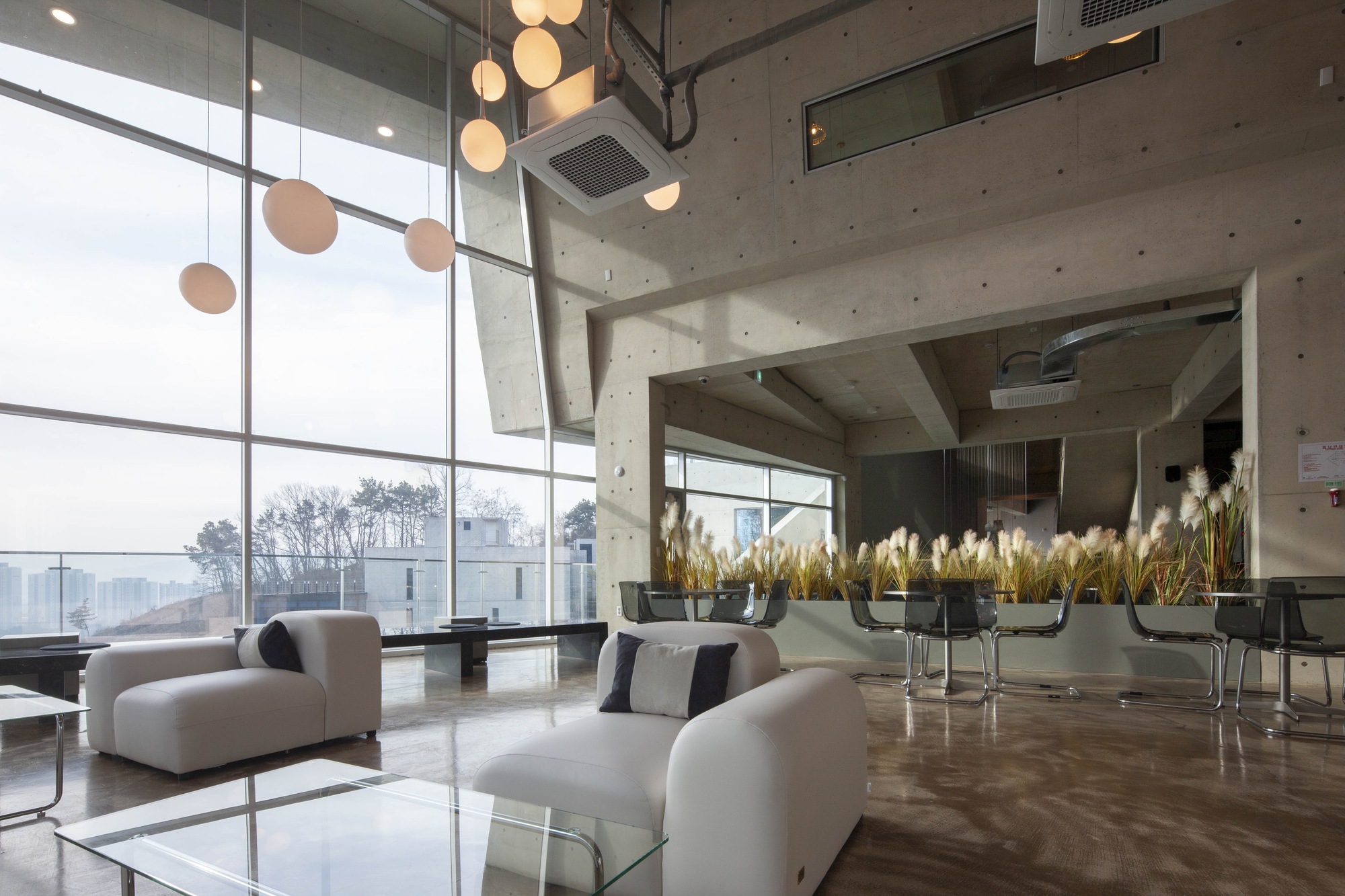 Cormeum Café and Neighborhood Facility / KARO Architekten-19