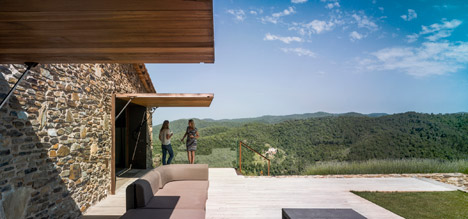 Weathered steel and stone combine in Zest Architecture's restored farmhouse-33