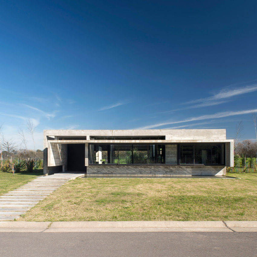 Spectacular Concrete House Surrounded by Fields and Vegetation-1