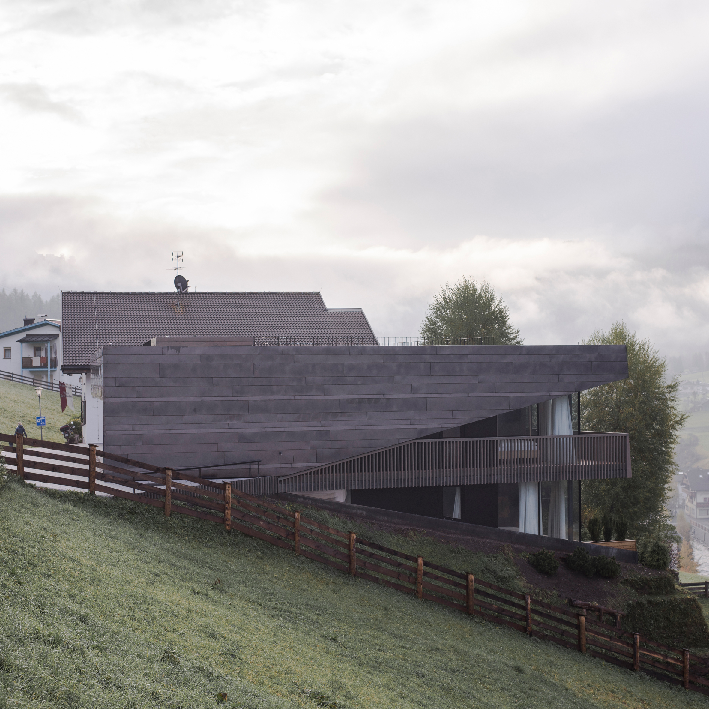 Plasma's copper-clad apartments have huge windows facing Dolomites-0