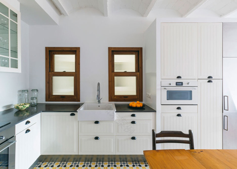 Barcelona apartment renovation by Nook with tiles and window seat-6