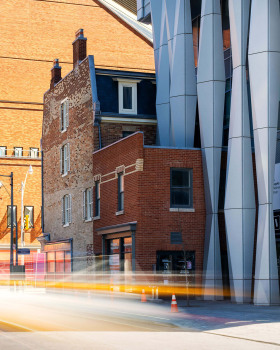 Brendan McNeill photographs "curious juxtaposition" between Toronto's historic buildings and modern skyscrapers
