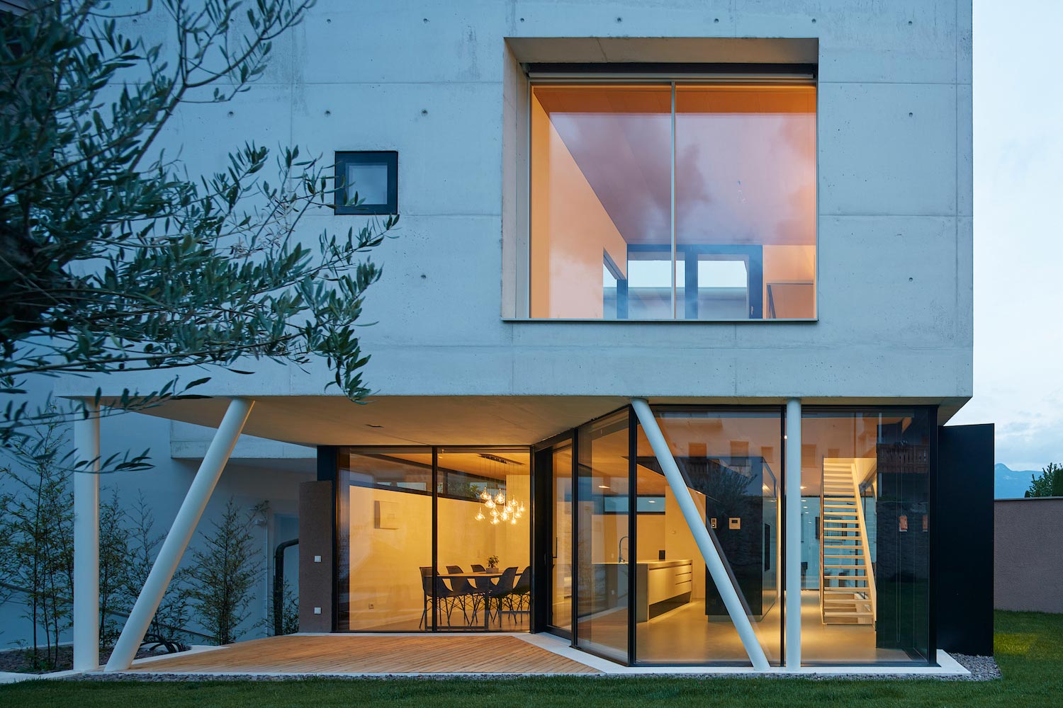 Concrete house uses old walls to create private patio allowing to add full glass walls to the residence   CAANdesign  Architecture and home design blog-2